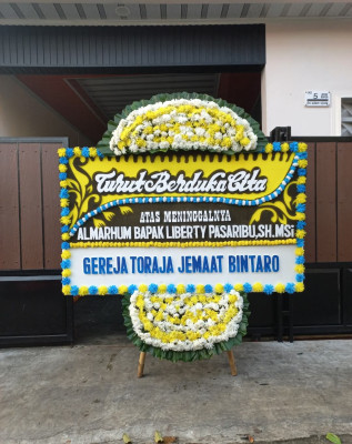 Papan Bunga Duka di Maduran
